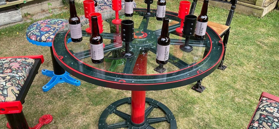 steampunk table in garden with chairs