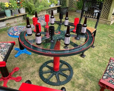 steampunk table in garden with chairs